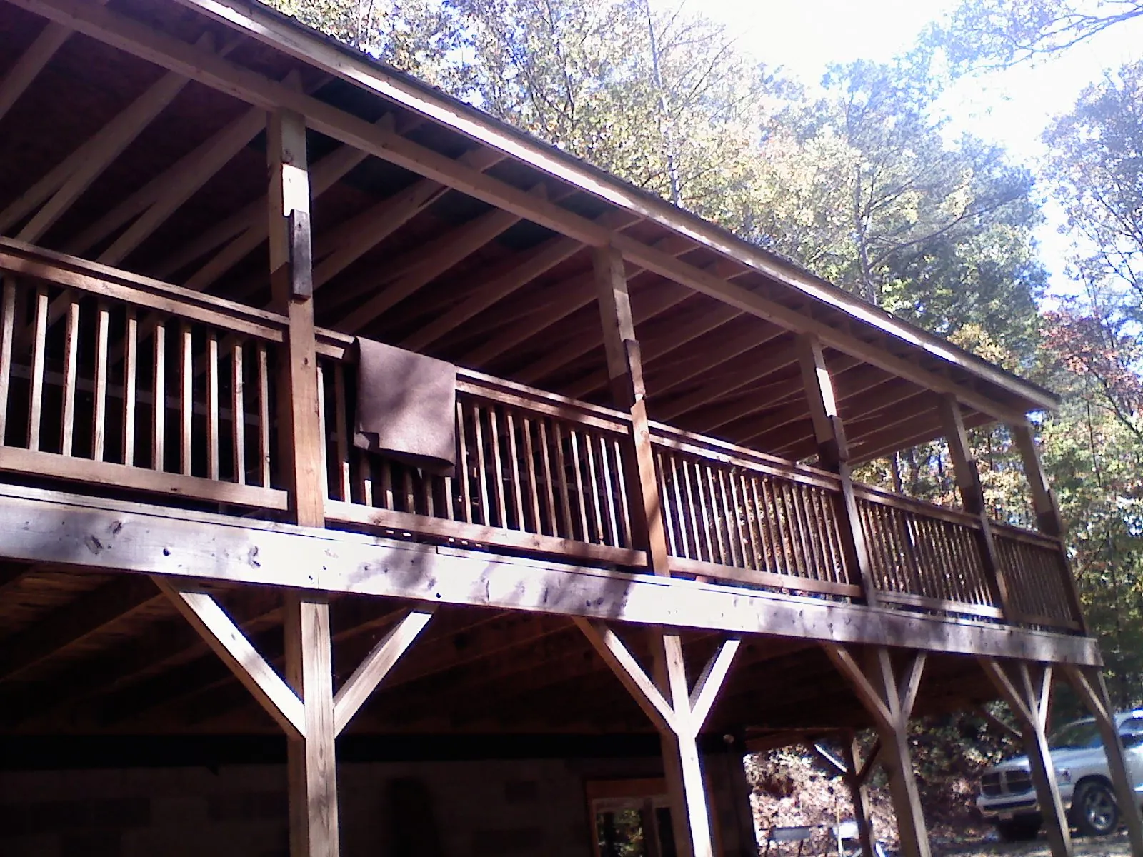 Timber framing under a new elevated porch and deck — Roof Leak Repair in Hensley by Roofing Brothers